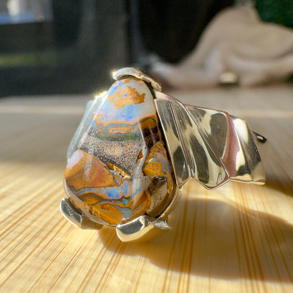 Nature's Masterpiece: Silver Boulder Opal Triangle Ring